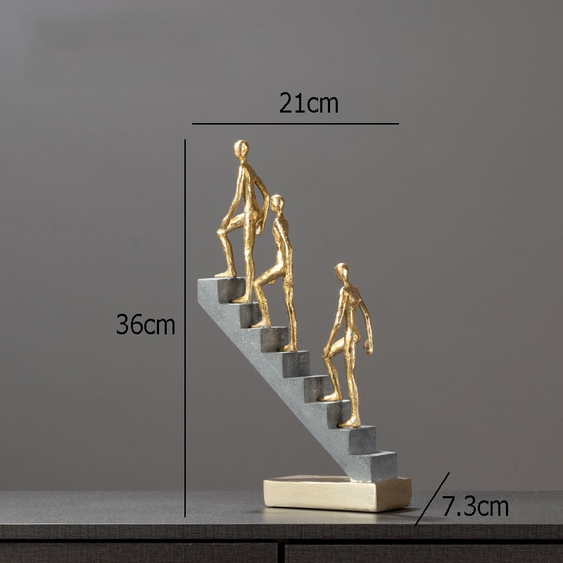 Man Climbing Stairs Statue